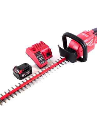 Cortasetos a batería Milwaukee M18 CHT-501C 18 V 610 mm sin escobillas + 1x batería 5,0 Ah + cargador