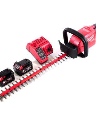 Cortasetos a batería Milwaukee M18 CHT-502C 18 V 610 mm sin escobillas + 2x baterías 5,0 Ah + cargador