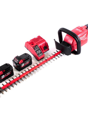 Cortasetos a batería Milwaukee M18 CHT-902C 18 V 610 mm sin escobillas + 2x baterías 9,0 Ah + cargador